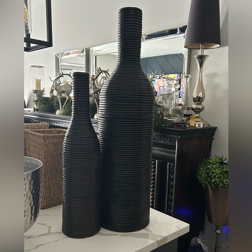 Wicker decor 
Two tall bases display pots